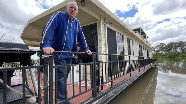 Oz Houseboats owner and manager Peter Sommers with one of his fleet at Murray Bridge Marina. picture Dylan Hogarth