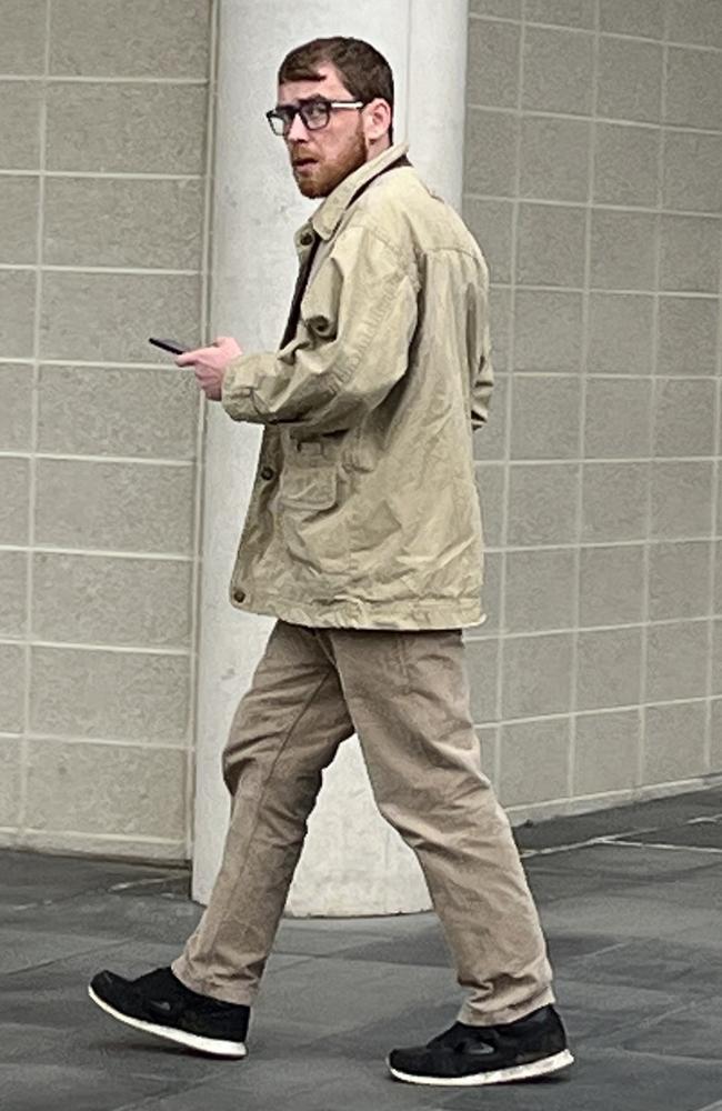 Taylor John Jones leaves the ACT Law Courts on Monday October 17, 2022. Jones pleaded guilty to arson, common assault and possessing an offensive weapon. Picture: Julia Kanapathippillai