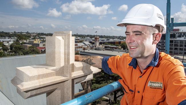 Blake Roxborough, foreman, and his team restored and installed sandstone and window protectors at St Lukes Anglican church, including a new sandstone cross. Thursday, March 24, 2022. Picture: Nev Madsen.