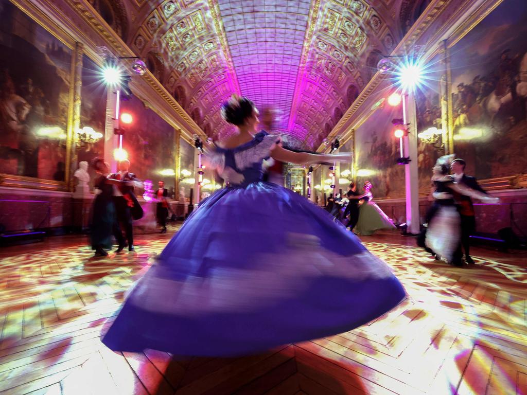 Guests dressed in period costumes take part in the ball of the century at the Chateau de Versailles in France. Picture: Emmanuel Dunand/AFP
