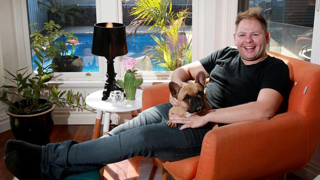 Chef Nelly Robinson owns Nel restaurant in Surry Hills. Pictured at his Stanmore home with his favourite things, including french bulldog Lola. Pictures: Toby Zerna