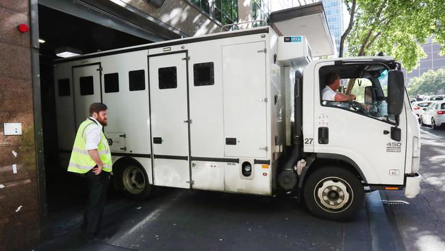 A prison van leaves the Magistrates’ Court. Picture: David Crosling