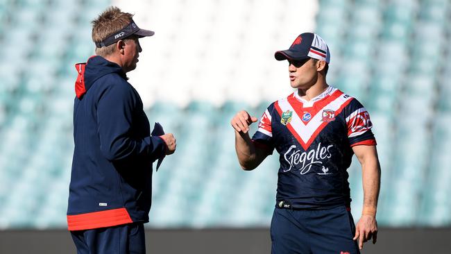 Cooper Cronk speaks with coach Trent Robinson during a Roosters training session at Allianz Stadium. Picture: AAP