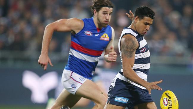 Geelong’s Tim Kelly and Bulldog Marcus Bontempelli are on the wings. Pic: Michael Klein.