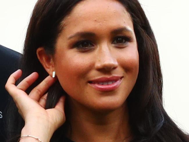 LONDON, ENGLAND - JUNE 29:  Prince Harry, Duke of Sussex and Meghan, Duchess of Sussex look on during the pre-game ceremonies before the MLB London Series game between Boston Red Sox and New York Yankees at London Stadium on June 29, 2019 in London, England. (Photo by Dan Istitene - Pool/Getty Images)