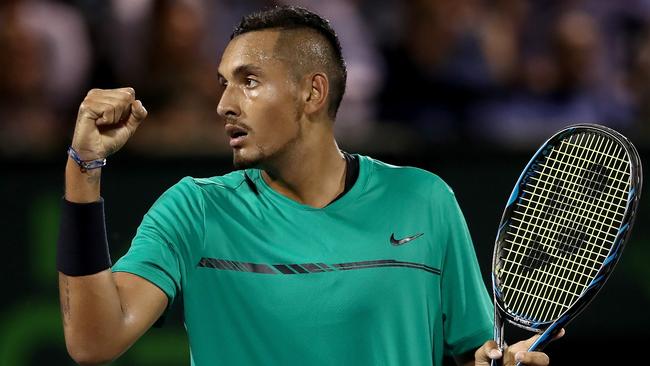 Nick Kyrgios of Australia celebrates a point in his match against Roger Federer.