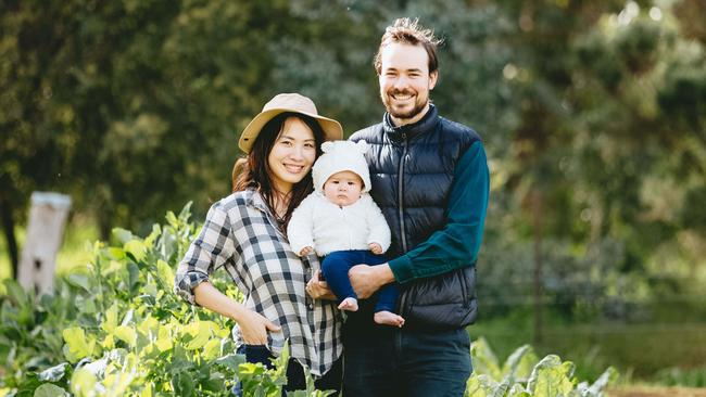 Herry's Harvest market gardener Jack Herry with his wife, Arisa, and daughter, Poppy. Picture: Chloe Smith