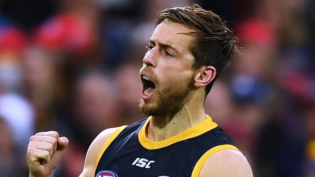 ADELAIDE, AUSTRALIA - AUGUST 17: Richard Douglas of the Adelaide Crows celebrates a goal during the round 22 AFL match between the Adelaide Crows and the Collingwood Magpies at Adelaide Oval on August 17, 2019 in Adelaide, Australia. (Photo by Mark Brake/Getty Images)