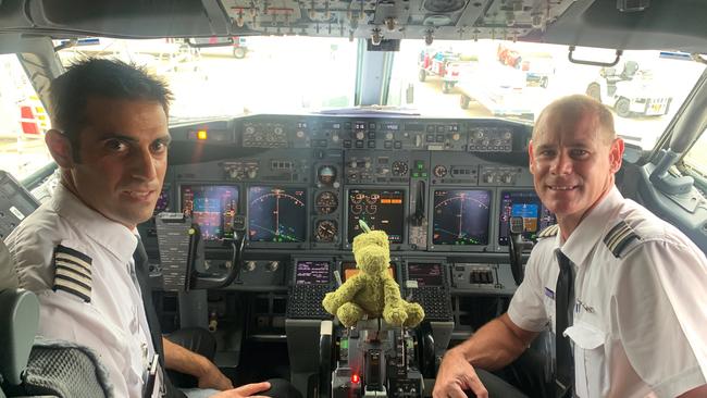 Dino the green fluffy dinosaur hitched a ride to Townsville after he was left on a Virgin Australia flight from Adelaide to Brisbane.