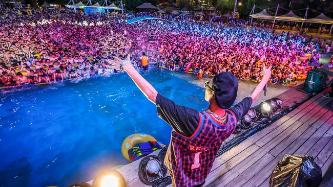 A performer holds court at a beach party in Wuhan in China’s central Hubei province. Picture: AFP