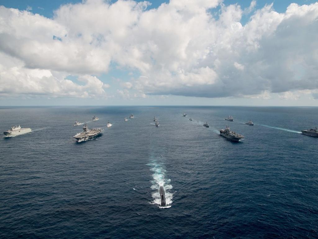 Led by submarine USS Key West, the HMAS Canberra III, USS Ronald Reagan (CVN 76), USS WASP LHD 1 and JS Ise (DDH-182) sail in the Coral Sea with other Royal Australian Navy, Royal Canadian Navy, Japan Maritime Self-Defense Force and US Navy ships during exercise Talisman Sabre. Picture: US Pacific Fleet/Facebook