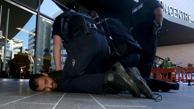 Protesters demonstrated at the SA Liberal’s Annual General Meeting on Sunday. Picture: Kelly Barnes/AAP