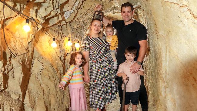 The mine was a big attraction for vendors Mark and Cathy Saxton, whose kids Isabella, 4, Will, 5, and Charlotte, 1, love playing down there. Picture: Ian Currie