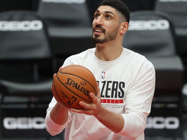 (FILES) In this file photo taken on February 20, 2021 Enes Kanter #11 of the Portland Trail Blazers warms up before their game against the Washington Wizards at Moda Center in Portland, Oregon. - NBA player Enes Kanter slammed China's President Xi Jinping as a 