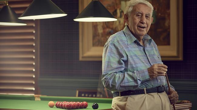 Real Estate mogul Harry Triguboff likes to unwind after a day of jousting with councils and town planners by playing billiards at his Sydney harbourside mansion. Picture: Nick Cubbin