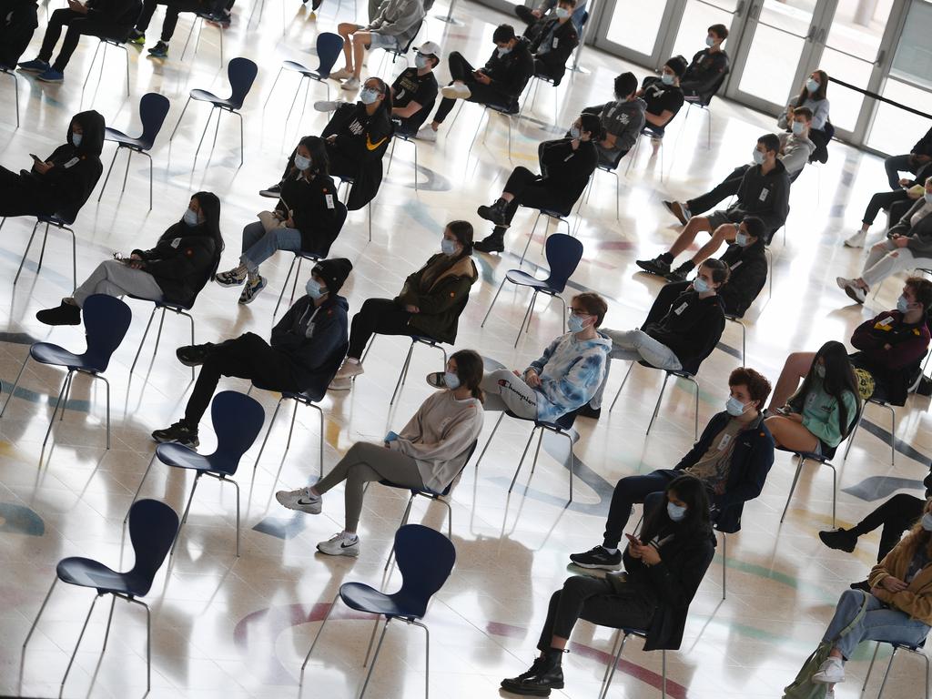 Year 12 students wait for Pfizer vaccinations at Qudos Bank Arena in Sydney. Picture: Dean Lewins/AAP