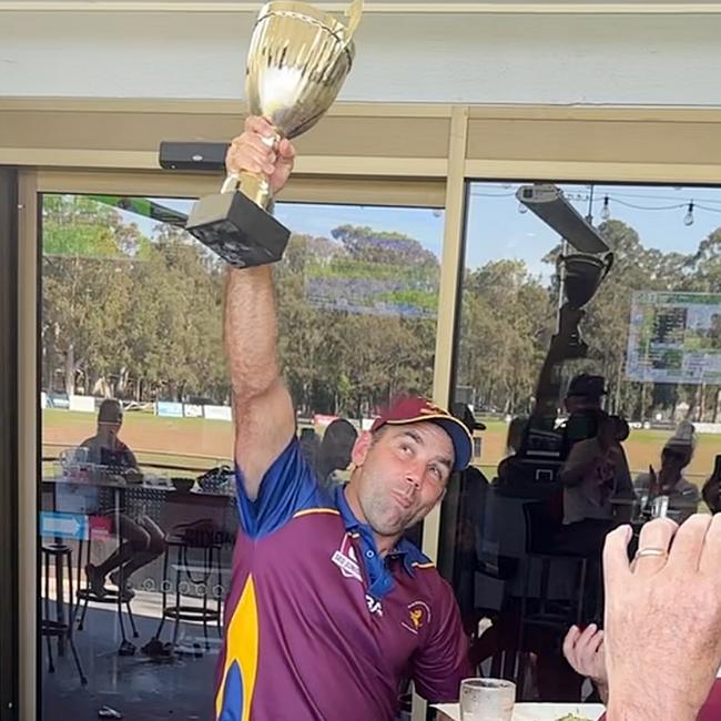 SUNDAY SCOOP: NRL legend Cameron Smith sips from his daughter's AFL premiership cup at the Palm Beach-Currumbin Lions clubhouse. Photo: Supplied.