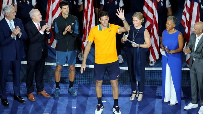 Juan Martin del Potro waves to the fans at the trophy presentation. Picture: Getty