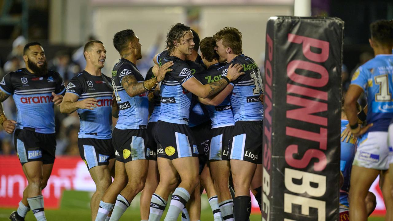 Sharks players enjoy a Toby Rudolf try. Picture: Brett Hemmings/Getty Images.