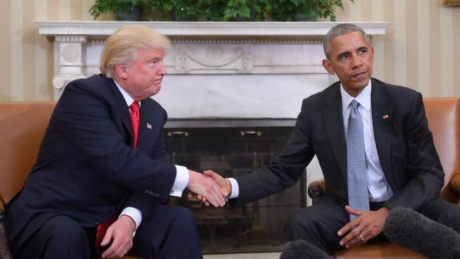 Then president-elect Donald Trump and Barack Obama during a transition planning meeting in the Oval Office. Picture: AFP