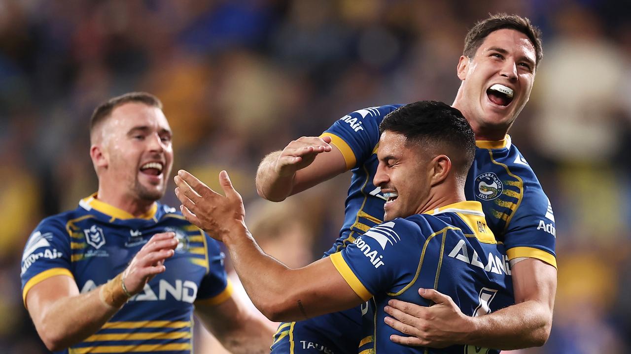 Dylan Brown celebrates with Clinton Gutherson and Mitchell Moses (Photo by Mark Kolbe/Getty Images)