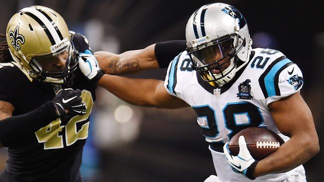 Jonathan Stewart #28 of the Carolina Panthers runs the ball.