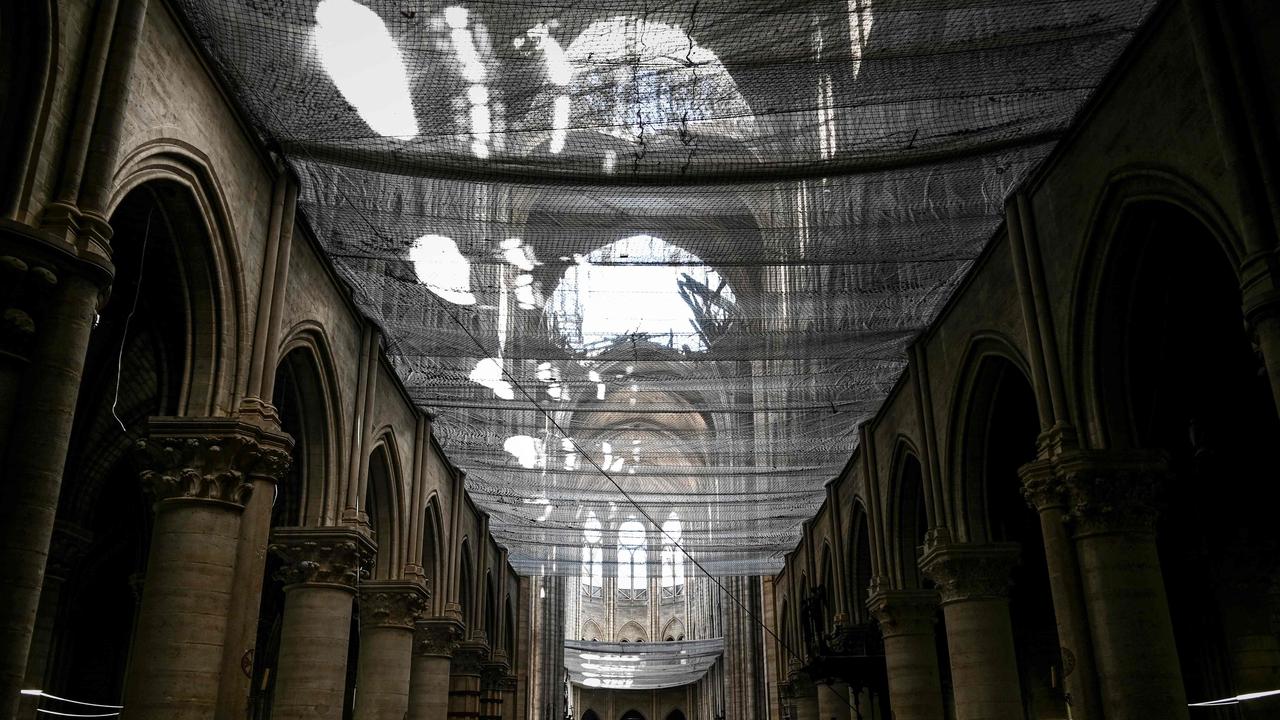 A protective net has been placed in the Notre Dame de Paris Cathedral during preliminary work. Picture: Philippe Lopez/POOL/AFP