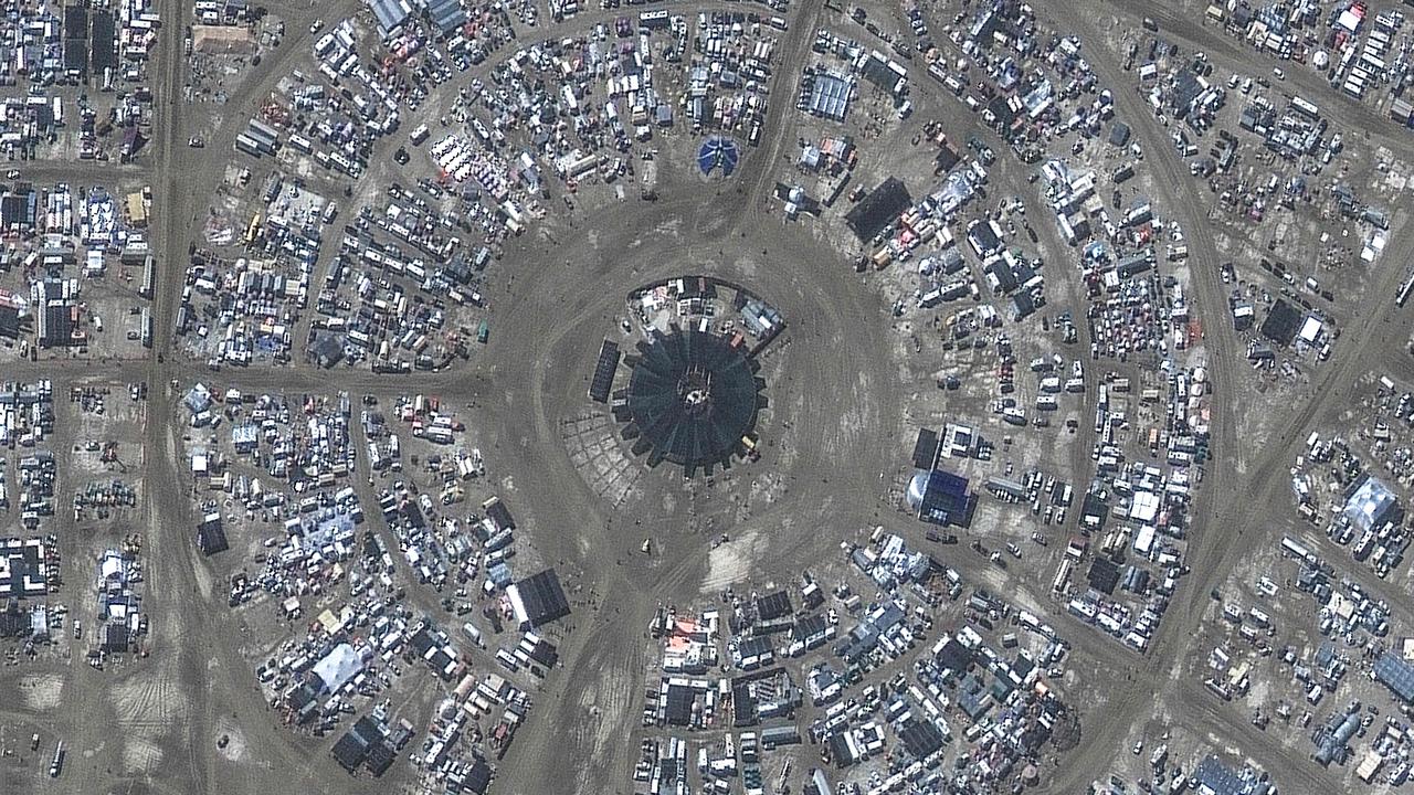 This handout satellite image courtesy of Maxar Technology shows an overview of the centre camp of Burning Man festival on September 4, 2023. (Photo by Satellite image Maxar Technologies / AFP)