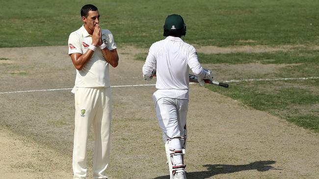 Mitchell Starcreacts while bowling during day one. Picture: Getty Images