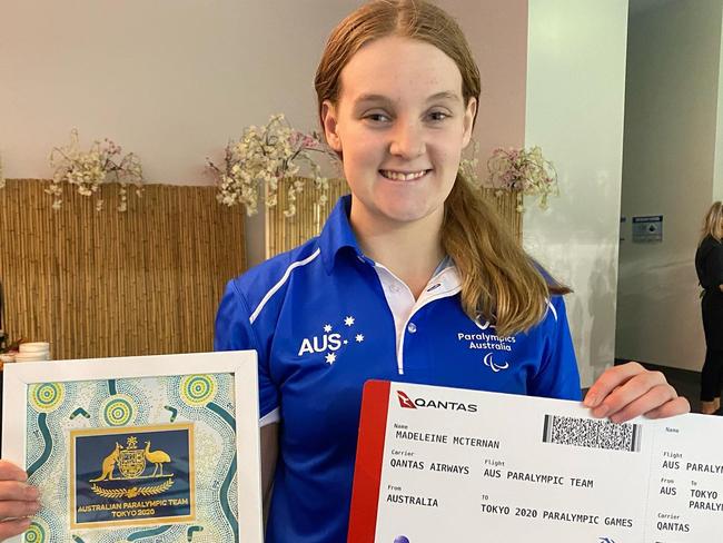 Former Coffs swimmer Maddie McTernan with her ticket to Tokyo after qualifying.