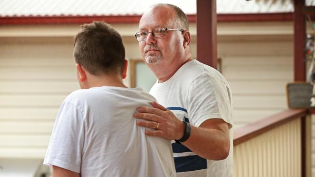 Carer Eddie with foster child James, who needs a family. Picture: Richard Dobson