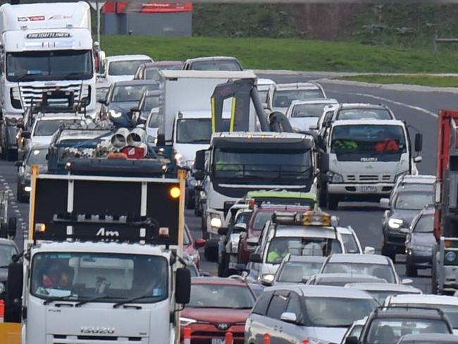 Another incident occured on the freeway that ambulance attendd to while Police MCIU investigate the cause of the crash involving An empty cattle truck and 5 cars crash on Western Ring road Laverton North.  Picture: Nicole Garmston