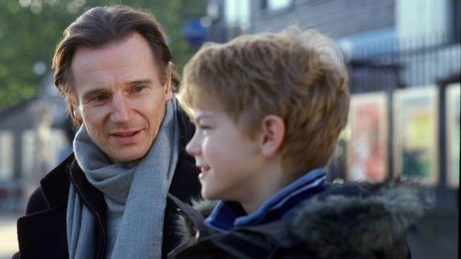 Liam Neeson and Thomas Brodie-Sangster in 2003 film Love Actually. Picture: Supplied