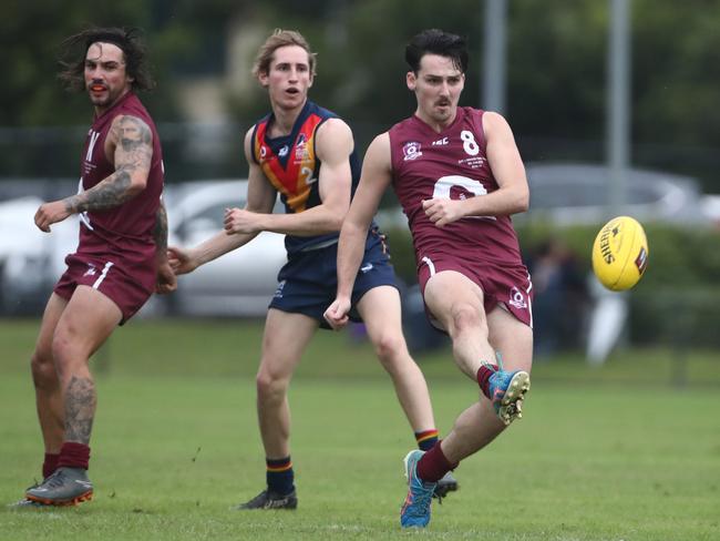 Thomas Thynne kicking for the QAFL representative side in their clash with the Adelaide Football League on Saturday, June 8, at Voxson Oval. Picture credit: AFLQ Media.