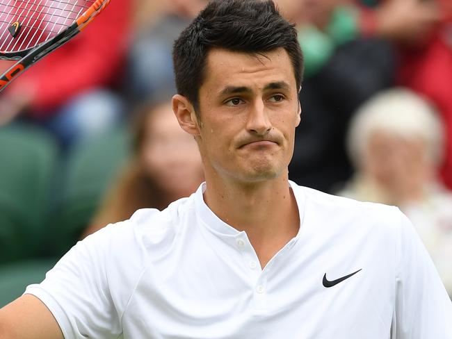 LONDON, ENGLAND - JUNE 29: Bernard Tomic of Australia reacts during the Men's Singles first round match against Fernando Verdasco of Spain on day three of the Wimbledon Lawn Tennis Championships at the All England Lawn Tennis and Croquet Club on June 29, 2016 in London, England. (Photo by Shaun Botterill/Getty Images)