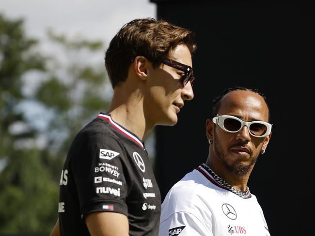 Mercedes duo George Russell and Lewis Hamilton walk in the Paddock prior to final practice session. Picture: Chris Graythen/Getty Images