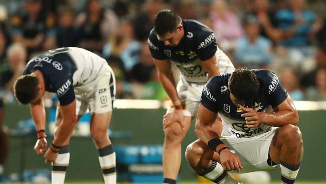 SYDNEY, AUSTRALIA - APRIL 03: Cowboys players look dejected after defeat during the round four NRL match between the Cronulla Sharks and the North Queensland Cowboys at Netstrata Jubilee Stadium, on April 03, 2021, in Sydney, Australia. (Photo by Mark Metcalfe/Getty Images)