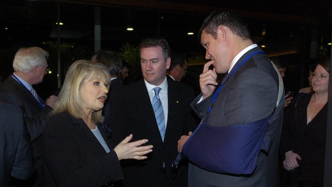 Then Communications Minister Helen Coonan with Eddie McGuire and James Packer in 2006.