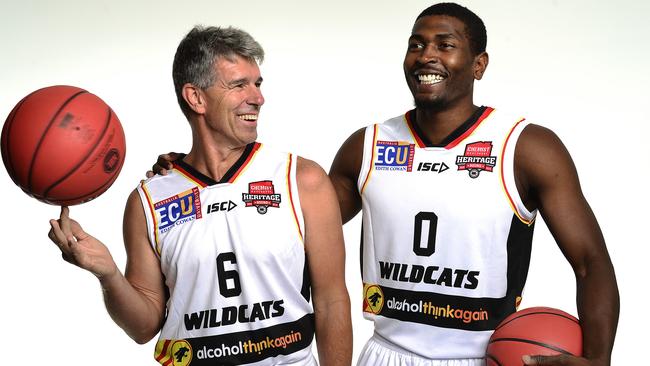 Perth Wildcats will wear a 'Heritage Round' singlet against Sydney Kings on Friday. Pictured is former captain Mike Ellis and current player Jermaine Beal. Picture: Richard Hatherly