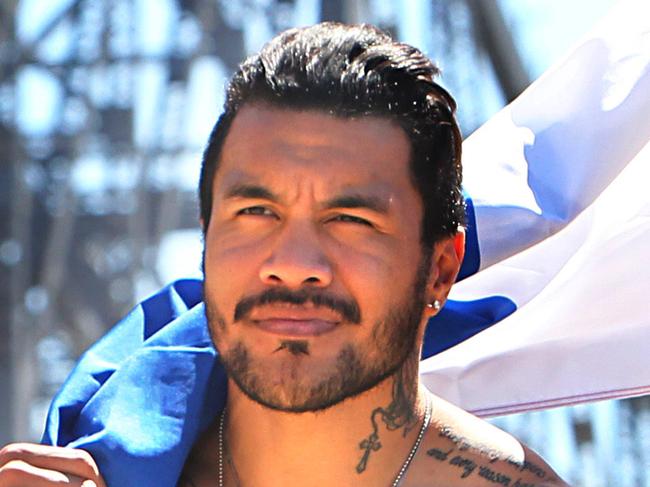 Departing Queensland Reds star Digby Ioane with a french flag at Kangaroo Point. Pic Annette Dew