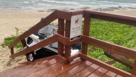 Car rolled onto Snapper Rocks beach in Coolangatta. Photo: Friends of Rainbow Bay Society/Facebook