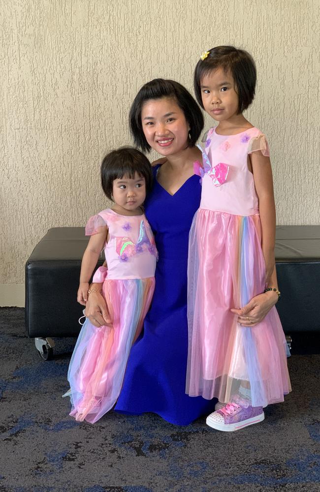 New Aussie Hoanghathi from Vietnam took her children (from left) Amy and Ann along with her for the citizenship ceremony at the MECC on Australia Day, January 26. Wednesday, January 26, 2022. Mackay Australia Day 2022. Mackay Citizenship Ceremony 2022. Picture: Duncan Evans