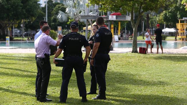 Police officers and paramedics attend to the incident on the Esplanade. PICTURE: BRENDAN RADKE