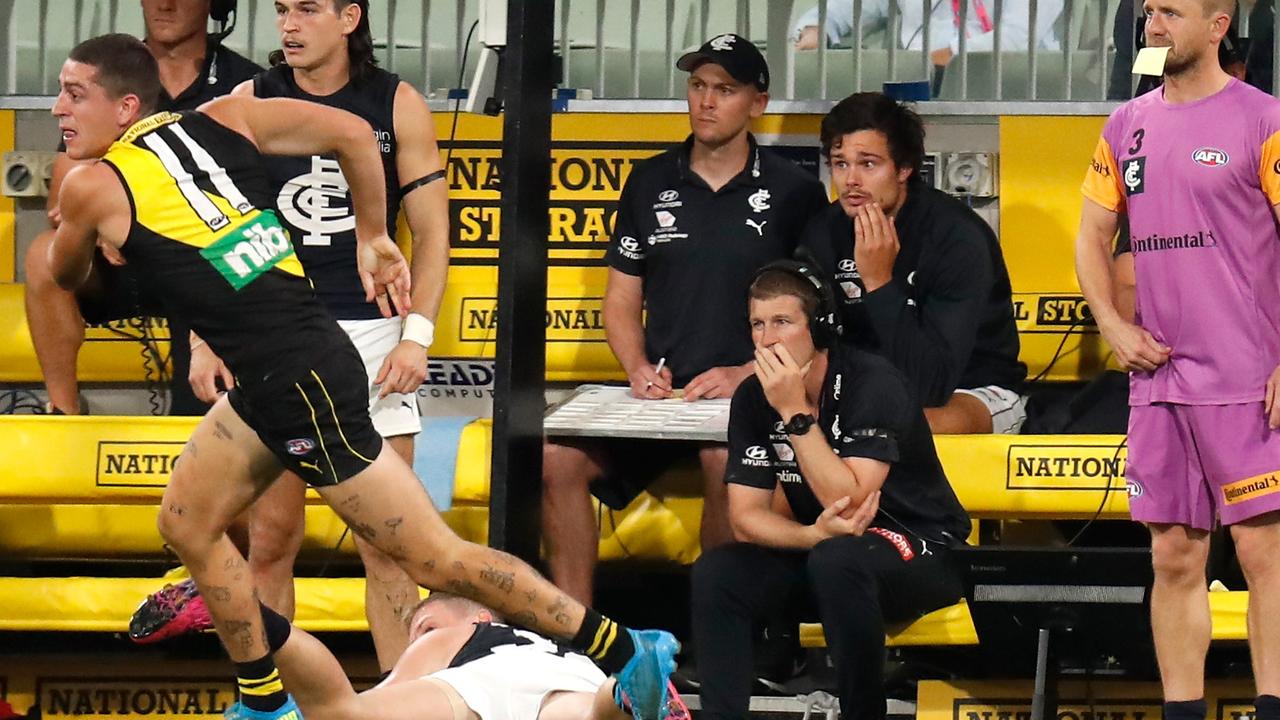 Jack Silvagni sits on the bench after being subbed out. Picture: Michael Willson/AFL Photos via Getty Images