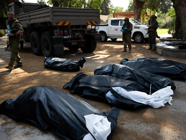 Four bodies of Israeli civilians killed in a sudden attack by Hamas militants. Picture: Getty Images