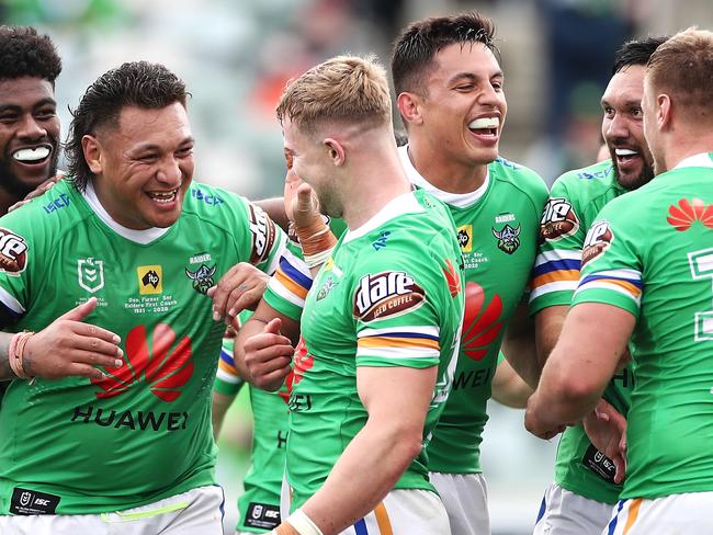 CANBERRA, AUSTRALIA - SEPTEMBER 20: Hudson Young of the Raiders celebrates with his team mates after scoring a try during the round 19 NRL match between the Canberra Raiders and the New Zealand Warriors at GIO Stadium on September 20, 2020 in Canberra, Australia. (Photo by Cameron Spencer/Getty Images)