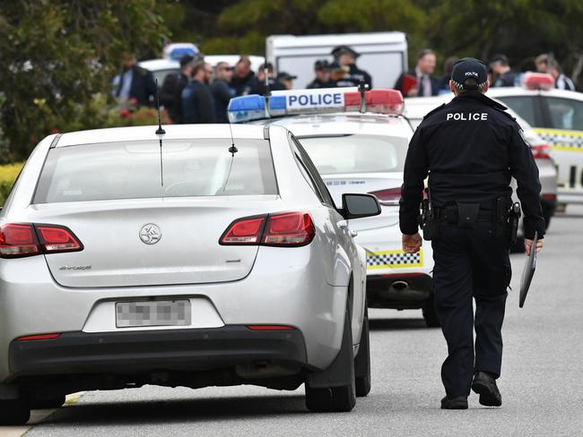 Police and detectives at Classic Street, West Lakes, at the scene of a house shooting today. Picture: Image AAP/Mark Brake