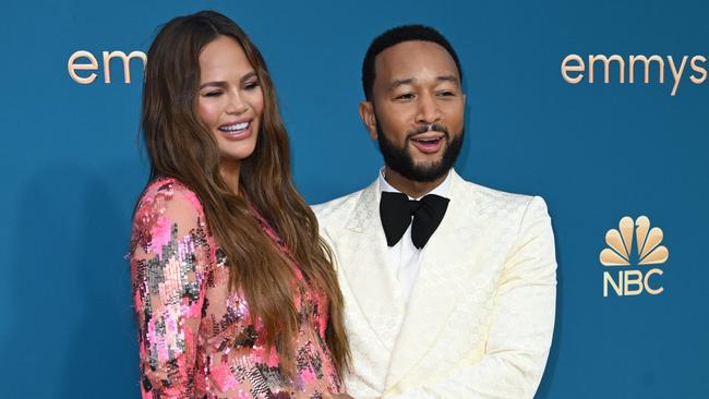 Teigen and husband John Legend. Picture: Robyn BECK / AFP