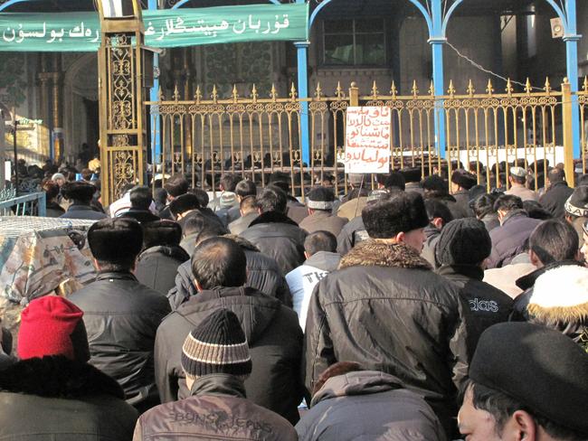 Ulighur Muslims at friday prayers. Urumqi Xinjiang; China