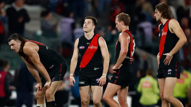 MELBOURNE, AUSTRALIA - AUGUST 10: Zach Merrett of the Bombers looks dejected after a loss during the 2024 AFL Round 22 match between the Essendon Bombers and the Gold Coast SUNS at Marvel Stadium on August 10, 2024 in Melbourne, Australia. (Photo by Michael Willson/AFL Photos via Getty Images)